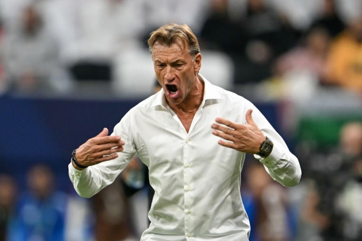 Saudi Arabia's French head coach Herve Renard reacts during the FIFA Arab Cup 2025 semi-final football match between Saudi Arabia and Jordan at the Al-Bayt Stadium in Al-Khor on December 15, 2025.  Mahmud HAMS / AFP
