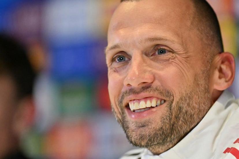 Ajax's Dutch head coach John Heitinga attends a press conference at Stamford Bridge in London on October 21, 2025, on the eve of their UEFA Champions League league phase football match against Chelsea.  Glyn KIRK / AFP