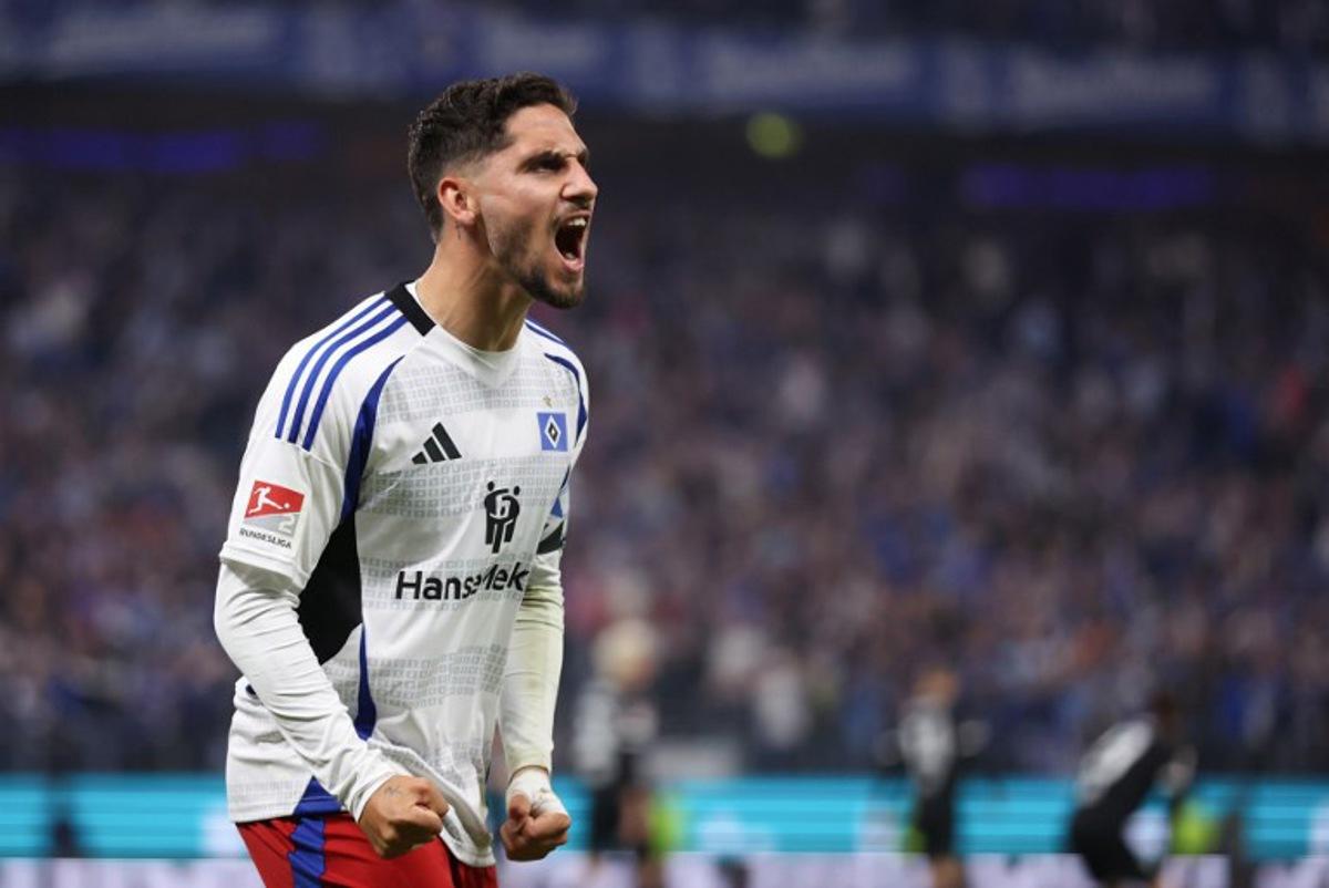 Hamburg's Slovakian midfielder #14 Ludovit Reis celebrates during the German second division Bundesliga football match between Hamburg SV and SSV Ulm 1846 in Hamburg, northern Germany on May 10, 2025. Hamburg SV will return to play in the first division next season. Ronny HARTMANN / AFP