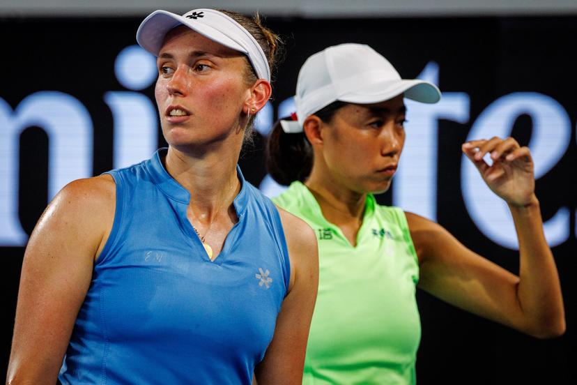 Belgium's Elise Mertens (blue) and Chinese Shuai Zhang (yellow) pictured during a tennis match between US pair Baptiste/Stearns and Belgian/ Chinese pair Mertens/Zhang, in the 1/8 final of the women doubles at the Australian Open, in Melbourne Park, Melbourne on Tuesday 27 January 2026.  BELGA PHOTO PATRICK HAMILTON  --- BENELUX ONLY   ---