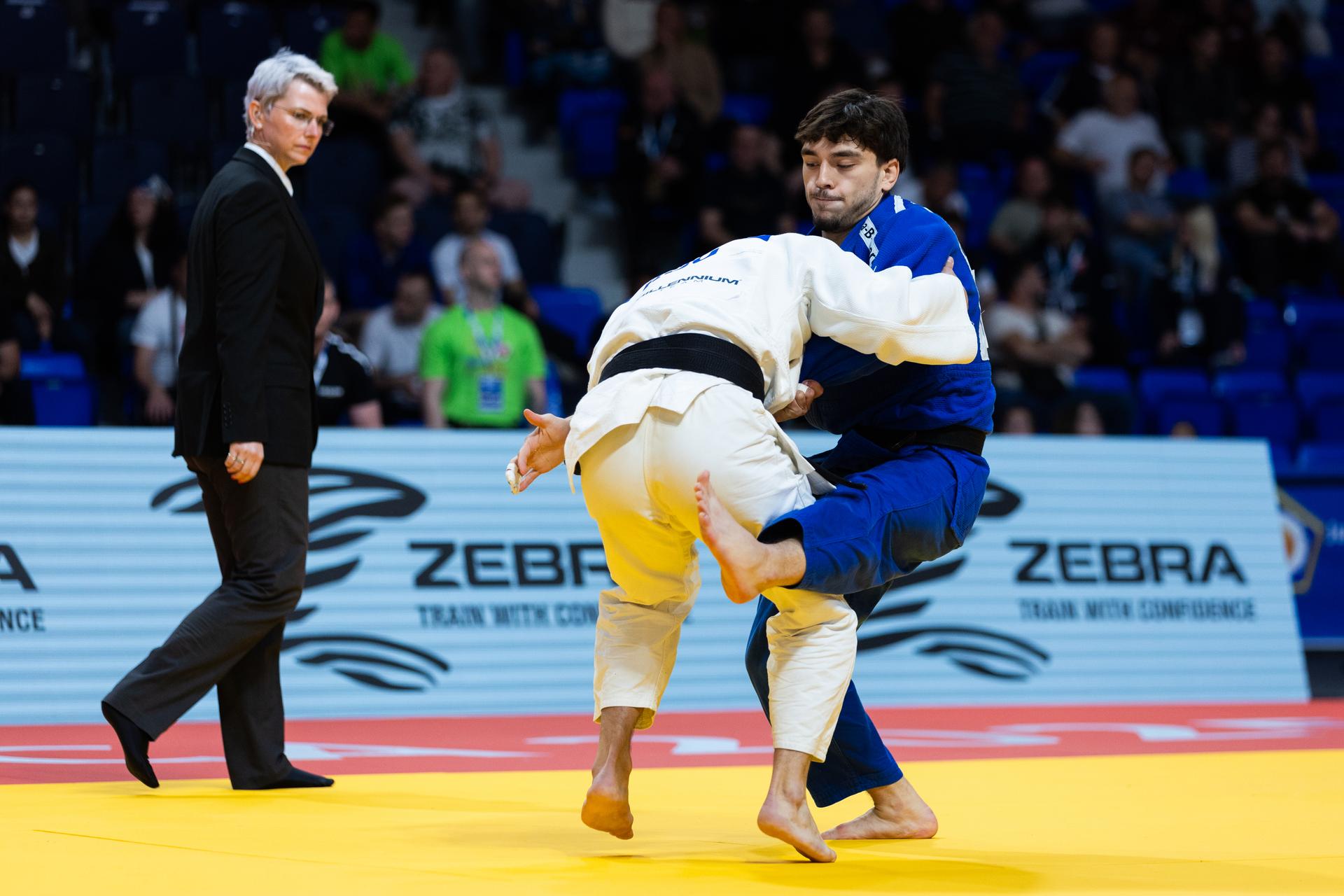 Belgian Zelemkhan Batchaev, Romanian Lucian Dumitrescu and pictured during a fight in the Men -73kg, at the European Judo Championships in Podgorica, Montenegro, on Thursday 24 April 2025. The tournament is taking place from 23 tot 27 April 2025. BELGA PHOTO NIKOLA KRISTC