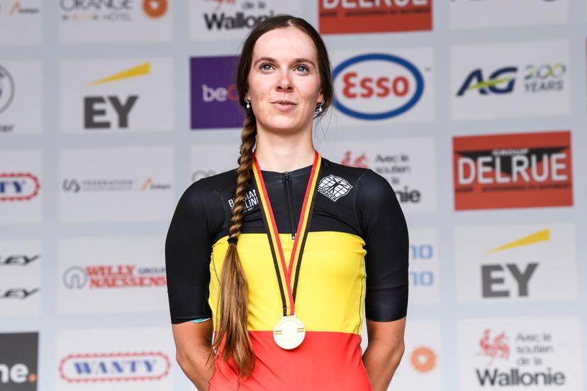 Belgian Sandrine Tas of Cyclingteam Belco/Van Eyck celebrates on the podium after winning the women without contract individual time trial of the Belgian Championships cycling, 38,5km, in Binche, on Thursday 20 June 2024. BELGA PHOTO GOYVAERTS