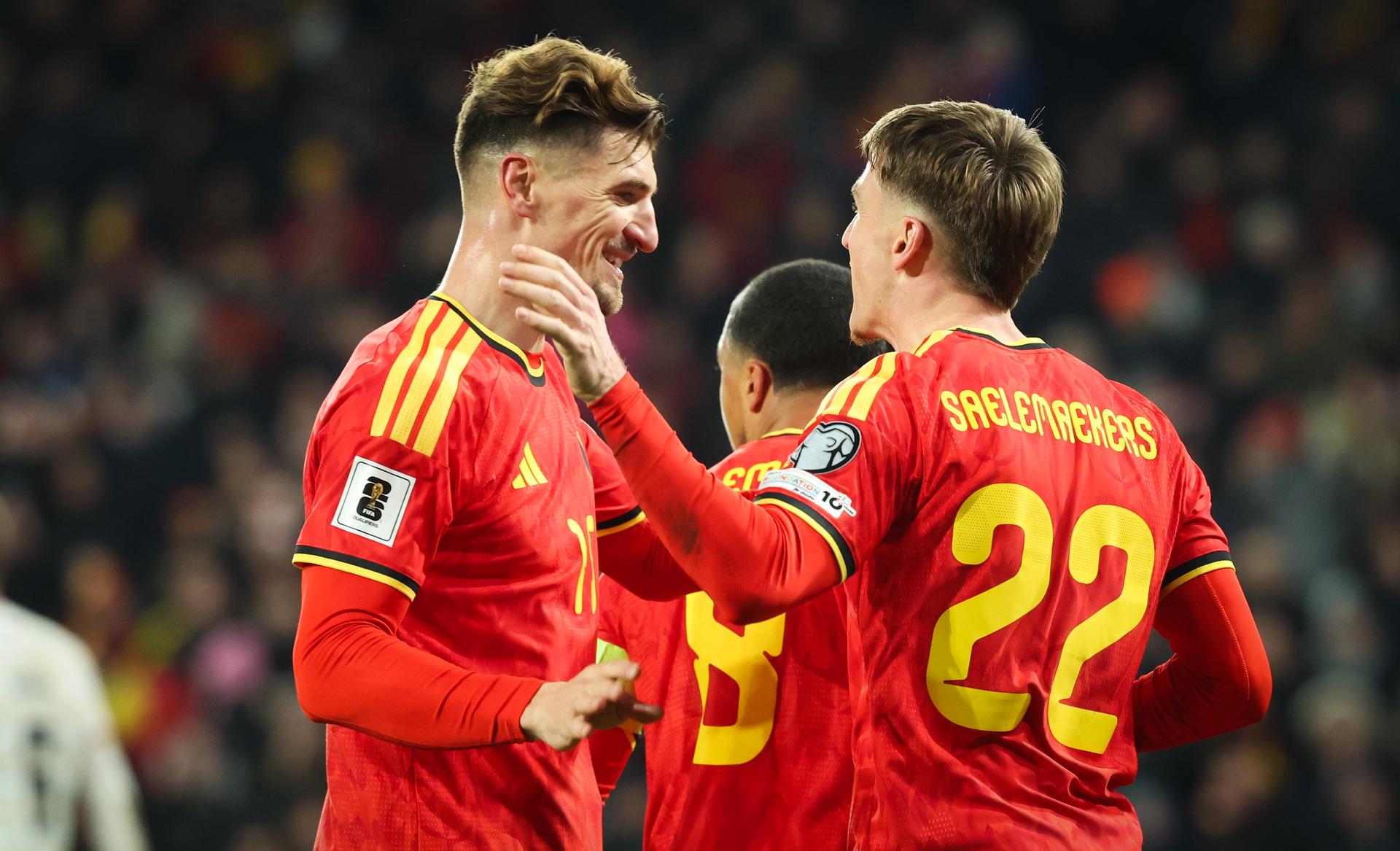 Belgium's Thomas Meunier and Belgium's Alexis Saelemaekers celebrate during a soccer game between Belgium's Red Devils and Liechtenstein, the last FIFA World Cup 2026 qualification match, in Liege on Tuesday 18 November 2025. BELGA PHOTO VIRGINIE LEFOUR