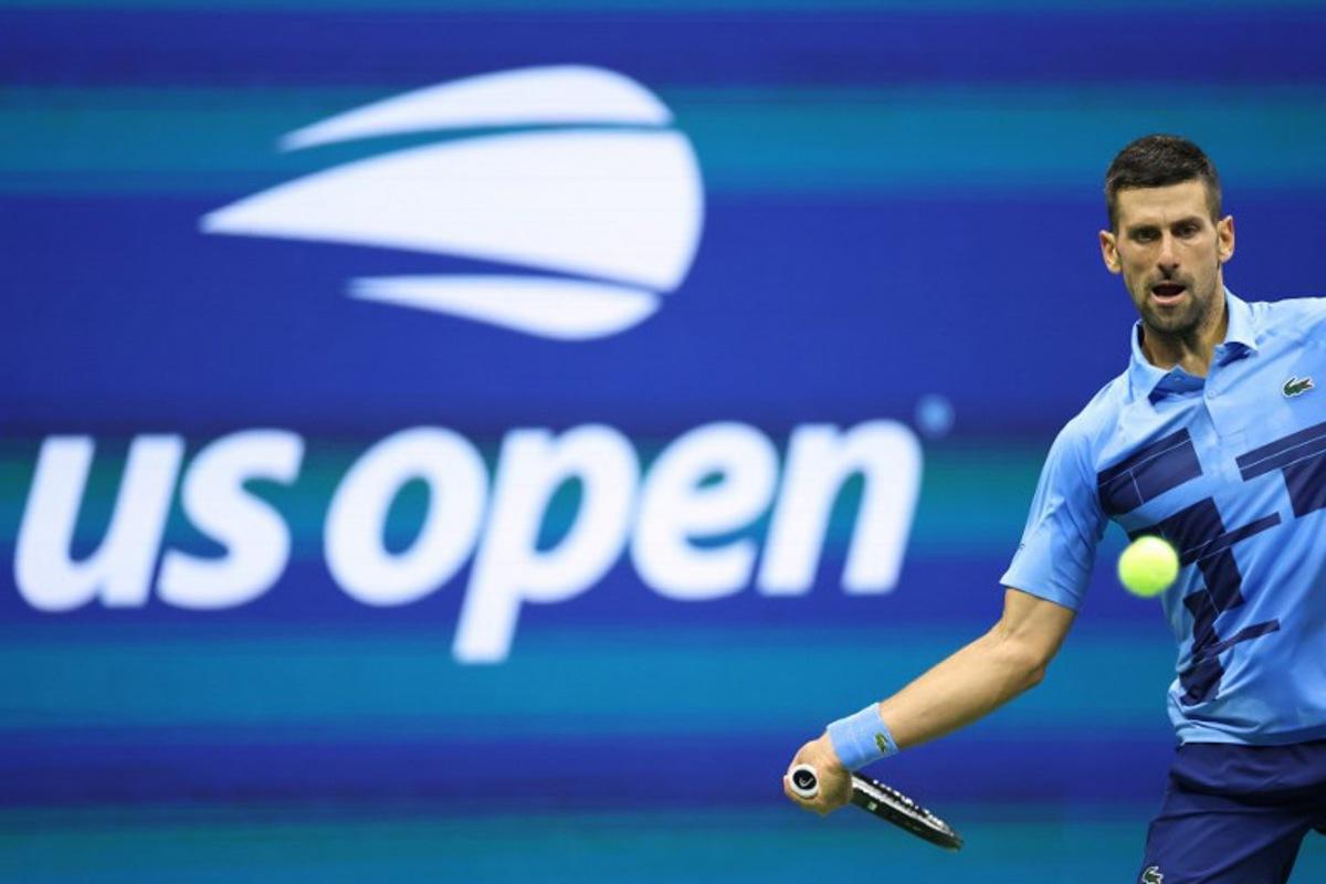 Serbia's Novak Djokovic returns the ball to Moldova's Radu Albot during their men's singles first round tennis match on day one of the US Open tennis tournament at the USTA Billie Jean King National Tennis Center in New York City, on August 26, 2024.  CHARLY TRIBALLEAU / AFP