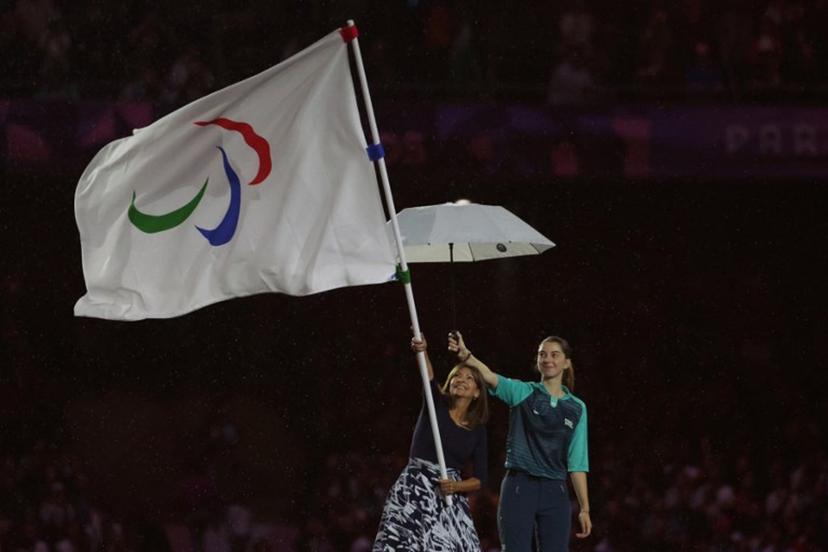 Mayor of Paris Anne Hidalgo waves the Paralympics flag during the Paris 2024 Paralympic Games Closing Ceremony at the Stade de France, in Saint-Denis, in the outskirts of Paris, on September 8, 2024.  Thibaud Moritz / AFP