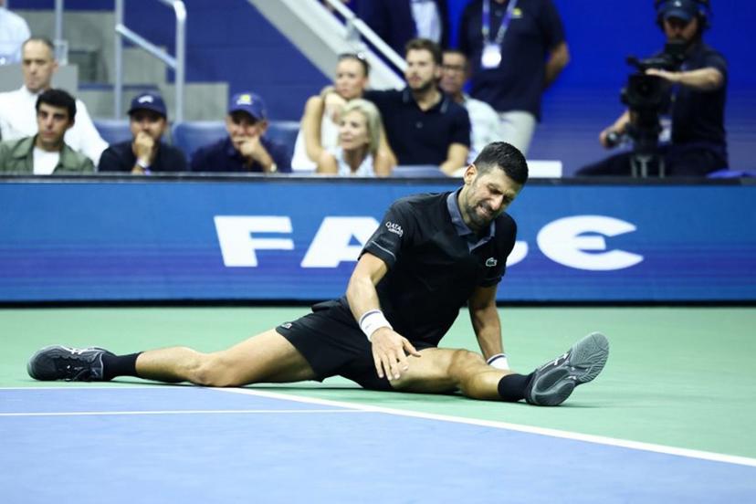 Serbia's Novak Djokovic reacts against Argentina's Mariano Navone during the men's singles first round tennis match on day one of the US Open tennis tournament at the USTA Billie Jean King National Tennis Center in New York City on August 30, 2026.  CHARLY TRIBALLEAU / AFP