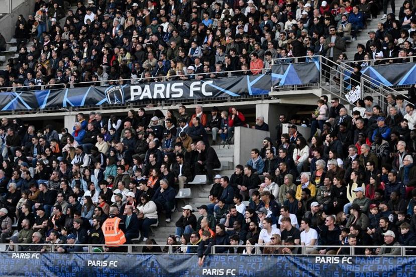 Paris FC's supporters attend the Ligue 2 football match between Paris FC and Lorient at the Charlety Stadium in Paris on March 8, 2025.  Anna KURTH / AFP