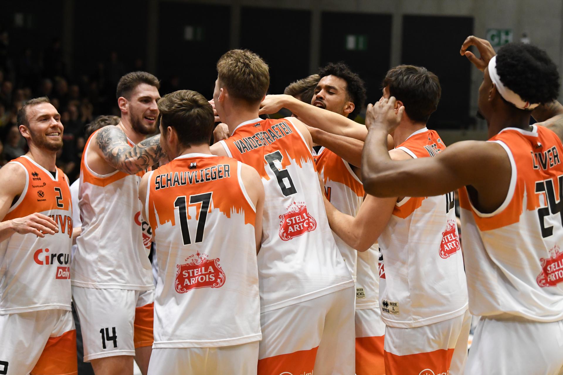 Leuven's players celebrate after winning a basketball match between Leuven Bears and House of Talents Spurs Kortrijk, Thursday 13 February 2025 in Leuven, the return leg of the semi-finals of the men's Belgian Basketball Cup. BELGA PHOTO JILL DELSAUX