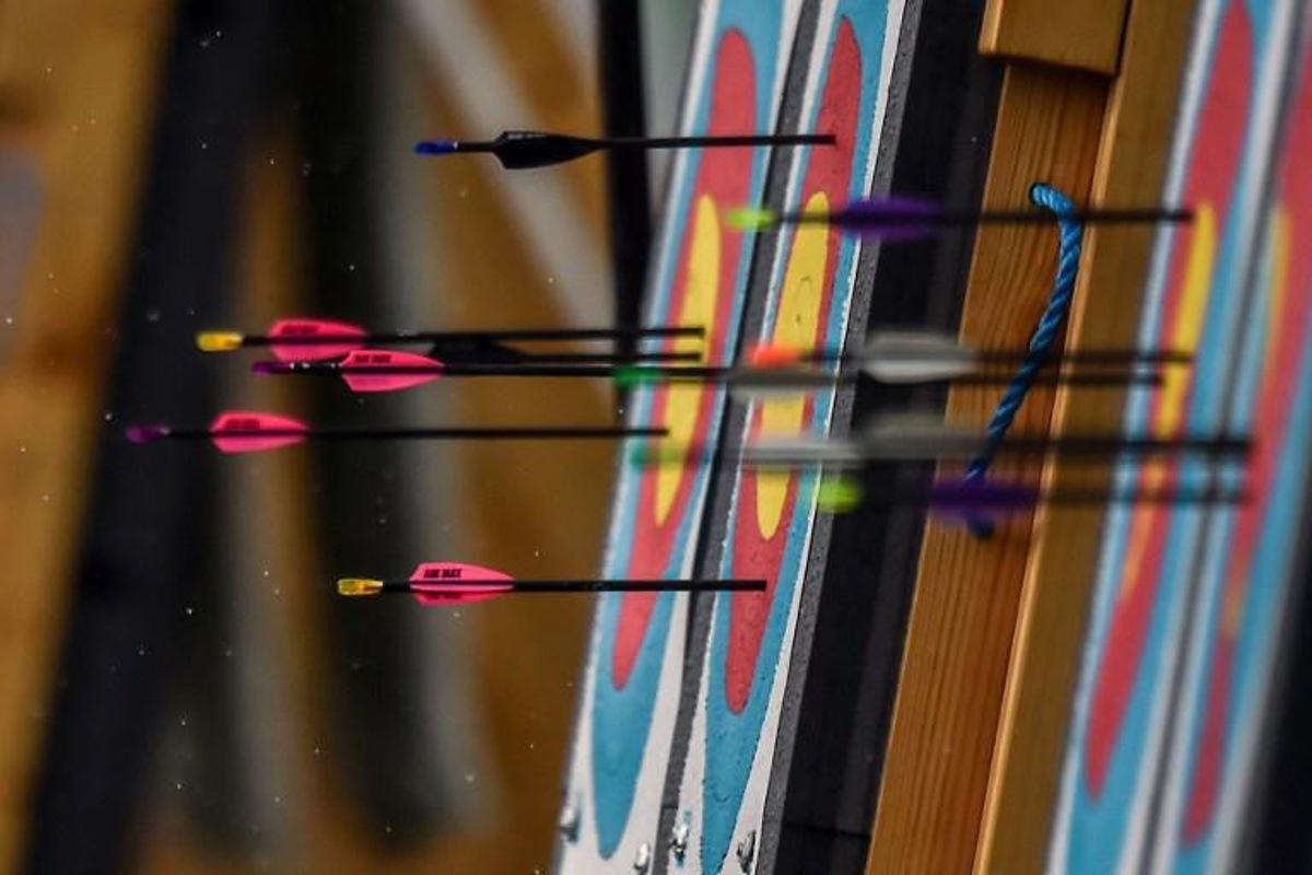 Picture of targets and arrows taken during the Women's Archery Compound Team final during the 2018 Central American and Caribbean Games (CAC), in Barranquilla, Colombia, on July 31, 2018.   Luis ROBAYO / AFP