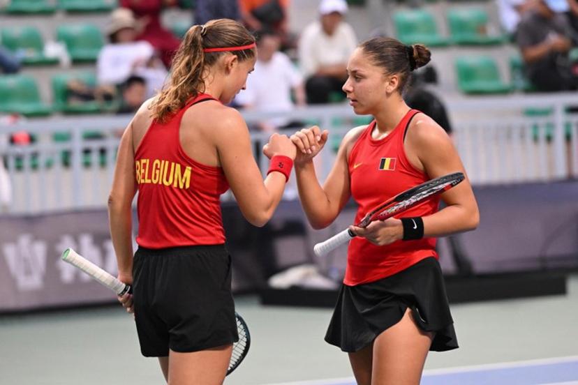 Belgium's Hanne Vandewinkel (L) and Sofia Costoulas (R) speak during their women's doubles match against China's Guo Hanyu and Jiang Xinyu at the Billie Jean King Cup tennis play-offs at the Guangzhou Nansha International Tennis Center in Guangzhou, in south China's Guangdong province on November 17, 2024.   STR / AFP
