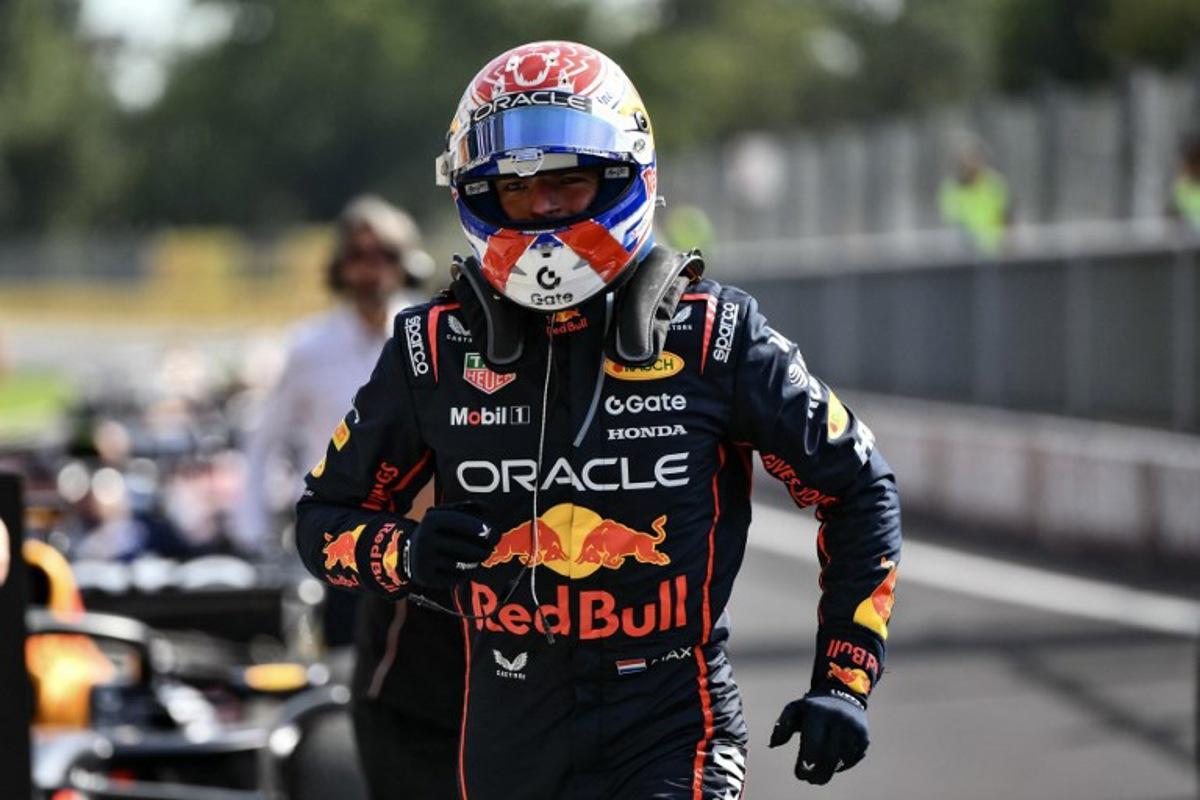 Red Bull Racing's Dutch driver Max Verstappen celebrates after winning the Italian Formula One Grand Prix at the Autodromo Nazionale Monza circuit, in Monza, northern Italy, on September 7, 2025.  Marco BERTORELLO / AFP