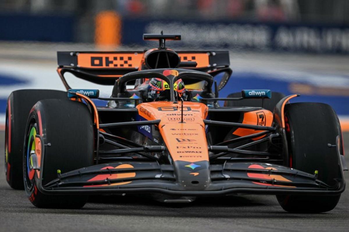 McLaren's Australian driver Oscar Piastri drives during the first practice session ahead of the Formula One Singapore Grand Prix night race at the Marina Bay Street Circuit in Singapore on October 3, 2025.  MOHD RASFAN / AFP