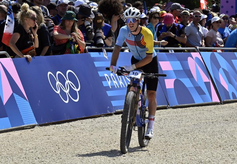 Belgian Jens Schuermans looks dejected after the men's cross-country mountain bike cycling race at the Paris 2024 Olympic Games, at the Colline d'Elancourt climb near Paris, France on Monday 29 July 2024. The Games of the XXXIII Olympiad are taking place in Paris from 26 July to 11 August. The Belgian delegation counts 165 athletes competing in 21 sports. BELGA PHOTO DIRK WAEM