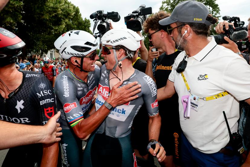 Dutch Mathieu van der Poel of Alpecin-Deceuninck and Belgian Jasper Philipsen of Alpecin-Deceuninck celebrate after winning the first stage, Lille Metropole to Lille Metropole (185 km), of the 2025 Tour de France cycling race, in Lille, France, on Saturday 05 July 2025. The 112th edition of the Tour de France starts on Saturday 5 July in Lille, France, and will finish in Paris, France on the 27th of July. BELGA PHOTO POOL LUCA BETTINI