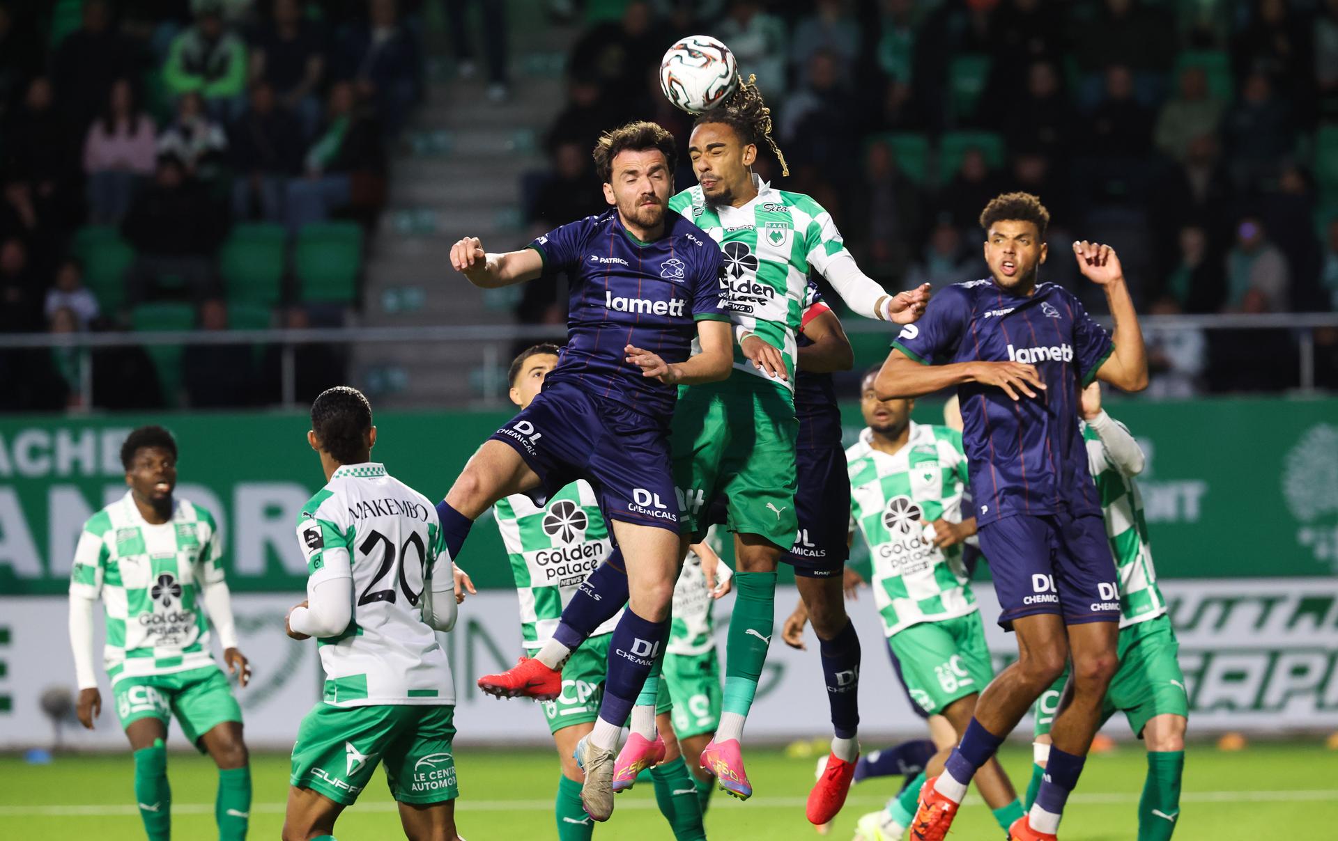 Essevee's Serxho Ujka and RAAL's Yllan Okou fight for the ball during a soccer match between RAAL La Louviere and SV Zulte Waregem, Sunday 19 April 2026 in La Louviere, on the third day of the Relegation Play-offs phase of the 2025-2026 'Jupiler Pro League' first division of the Belgian championship. BELGA PHOTO VIRGINIE LEFOUR