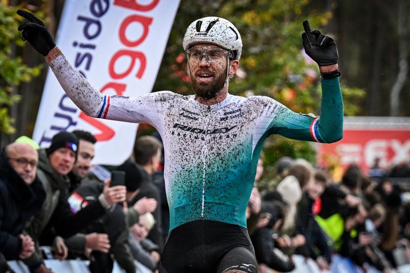 Dutch Joris Nieuwenhuis celebrates as he crosses the finish line to win the elite men's race of the Exact Cross, stage 3 (out of 7) in the Exact Cross cyclocross competition, in Heerde, on Saturday 25 October 2025. BELGA PHOTO DAVID PINTENS