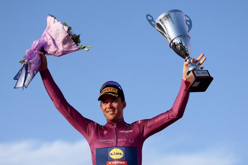 Lidl-Trek's Danish rider Mads Pedersen wearing the cyclamen jersey of best sprinter (Maglia Ciclamino) celebrates on the podium after the 21st and last stage of the 108th Giro d'Italia cycling race of 143kms from Rome to Rome on June 1, 2025.  Luca Bettini / AFP
