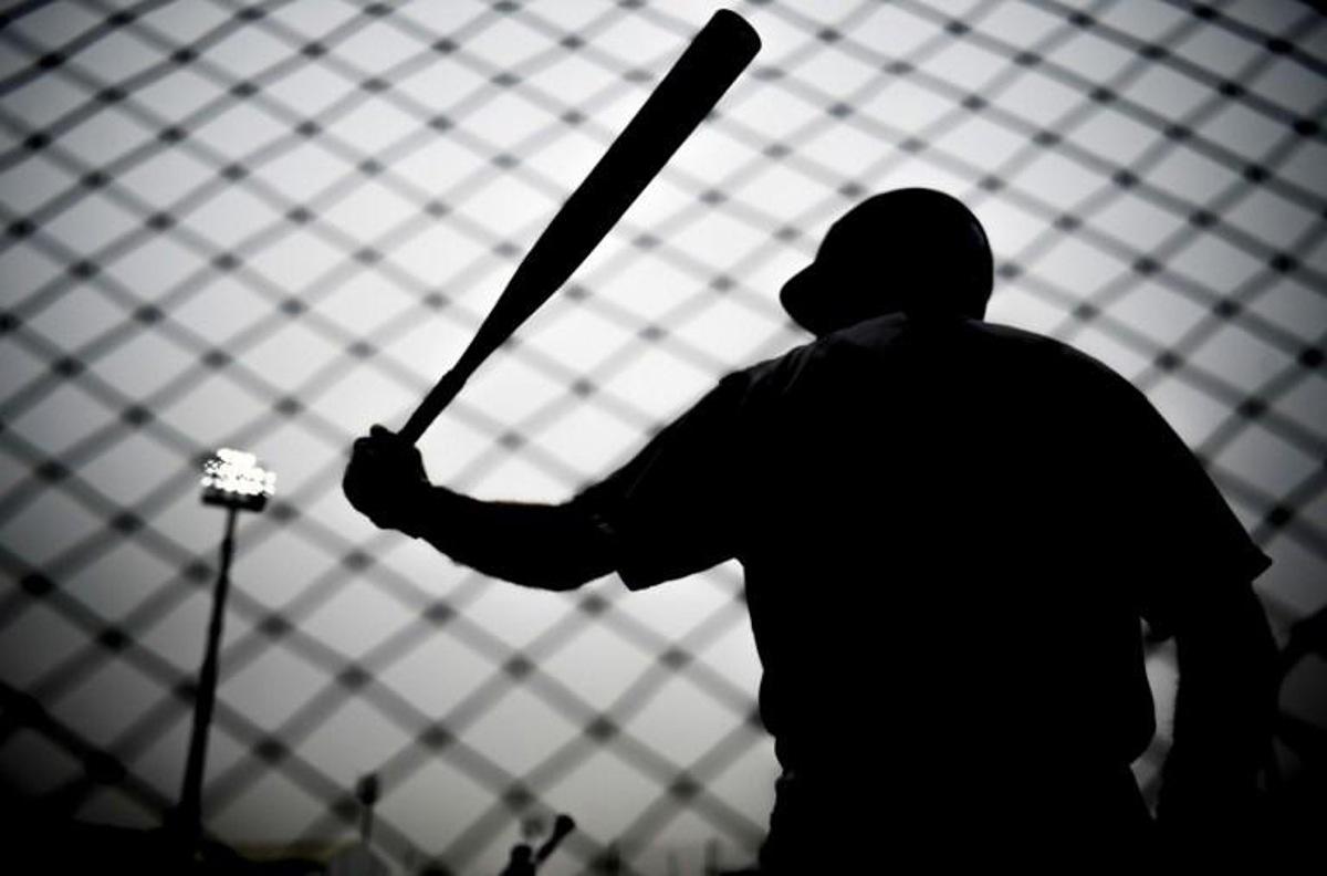 A players warms up before the start of the Softball's Men Grand Final between the US and Argentina during the Lima 2019 Pan-American Games in Lima, on August 1, 2019.  Ernesto BENAVIDES / AFP