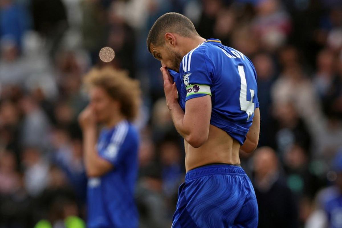Leicester City's English defender #04 Conor Coady reacts on the pitch after the English Premier League football match between Leicester City and Liverpool at King Power Stadium in Leicester, central England on April 20, 2025. Leicester were relegated from the Premier League after a 1-0 defeat to Liverpool. Darren Staples / AFP