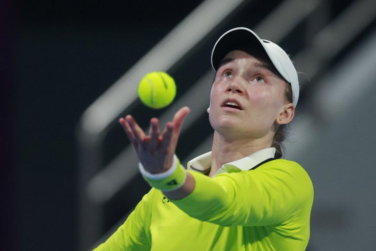 Kazakhstan's Elena Rybakina serves the ball against Canada's Victoria Mboko during their women's singles quarter-final match at the Qatar Open tennis tournament in Doha on February 12, 2026.  Karim JAAFAR / AFP