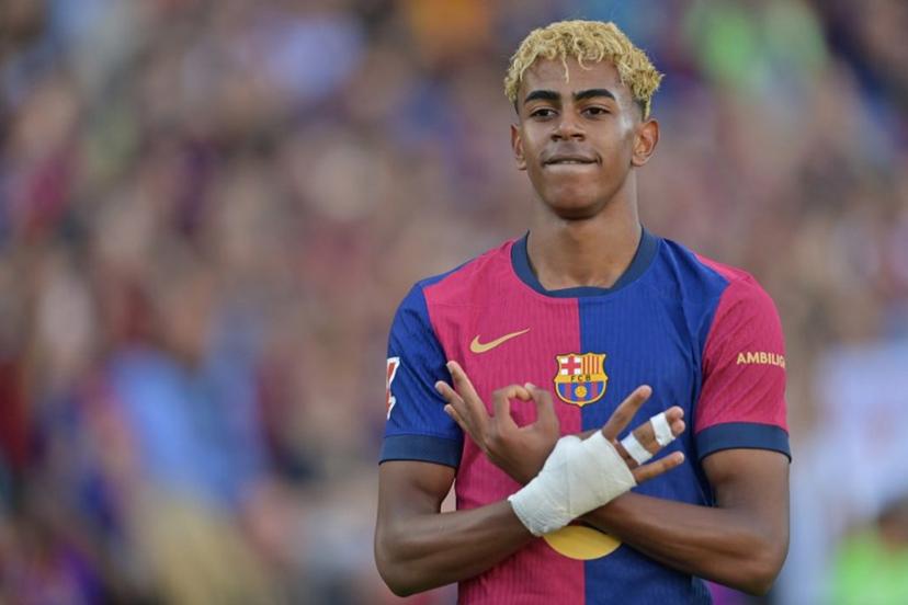 Barcelona's Spanish forward #19 Lamine Yamal celebrates scoring an equalizing goal during the Spanish league football match between FC Barcelona and Villarreal CF at Estadi Olimpic Lluis Companys in Barcelona on May 18, 2025.  MANAURE QUINTERO / AFP
