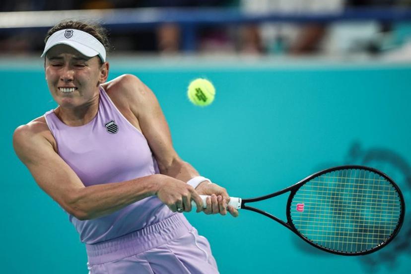 Russia's Ekaterina Alexandrova hits a return against Czech Republic's Sara Bejlek during their women's singles final match at the Abu Dhabi Open tennis tournament in Abu Dhabi on February 7, 2026.  Fadel SENNA / AFP