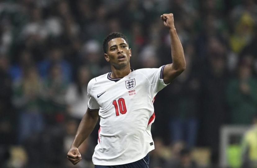 England's midfielder #10 Jude Bellingham celebrates scoring his team's first goal during the 2026 World Cup round of 16 football match between Mexico and England at the Mexico City Stadium in Mexico City on July 5, 2026.   Alfredo ESTRELLA / AFP