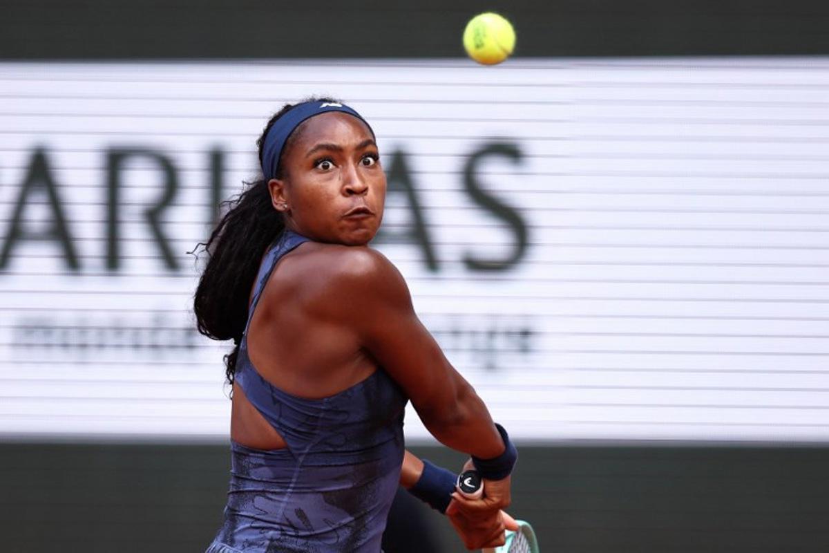 US Coco Gauff eyes the ball as she plays a backhand return to Russia's Ekaterina Alexandrova during their women's singles match on day 9 of the French Open tennis tournament on Court Philippe-Chatrier at the Roland-Garros Complex in Paris on June 2, 2025.  Anne-Christine POUJOULAT / AFP