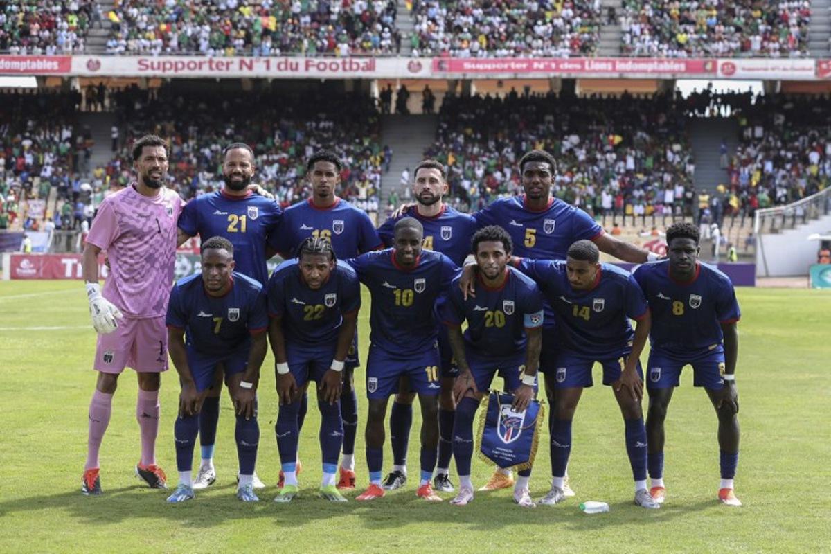 Cape Verde players pose for a team photo ahead of the FIFA World Cup 2026 Africa qualifiers group D football match between Cameroon and Cape Verde at Stade Ahmadou Ahidjo in Yaounde on June 8, 2024.  Daniel Beloumou Olomo / AFP