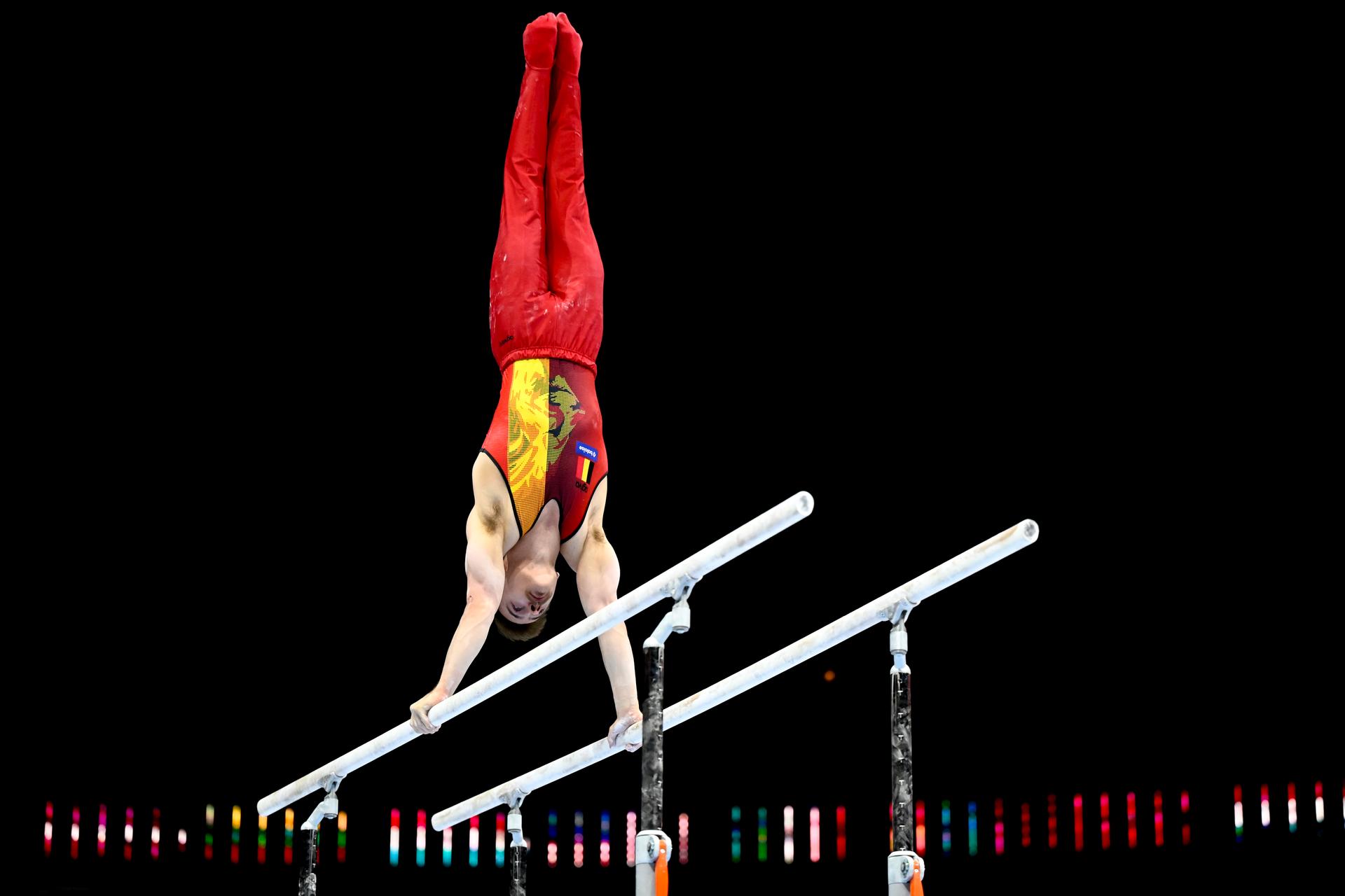 Belgian gymnast Nicola Cuyle pictured in action at the parallel bars during the men's qualifications on the first day of the Artistic Gymnastics World Championships, in Antwerp, Saturday 30 September 2023. The Worlds take place in Antwerp from 30 September to 08 October. BELGA PHOTO DIRK WAEM