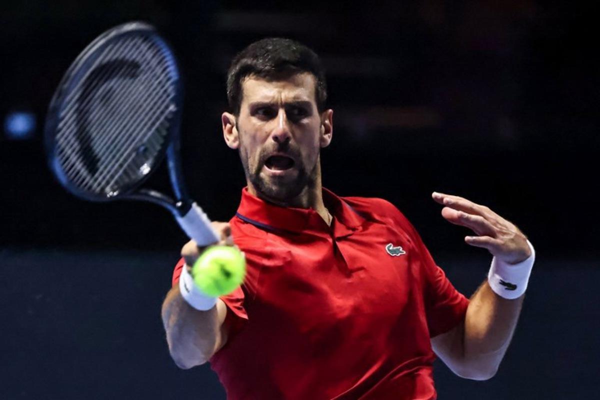 Serbia's Novak Djokovic hits a return against US' Taylor Fritz during the third-placed match at the Six Kings Slam exhibition tennis tournament in Riyadh on October 18, 2025.  Fayez NURELDINE / AFP