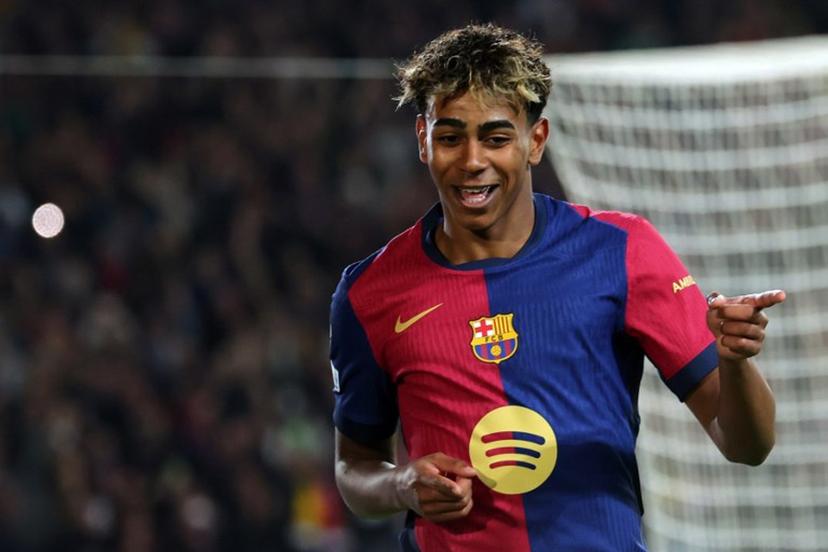 Barcelona's Spanish forward #19 Lamine Yamal celebrates scoring his team's fourth goal during the UEFA Champions League Quarter final First Leg football match between FC Barcelona and BVB Borussia Dortmund  at the Estadi Olimpic Lluis Companys in Barcelona on April 9, 2025.   LLUIS GENE / AFP