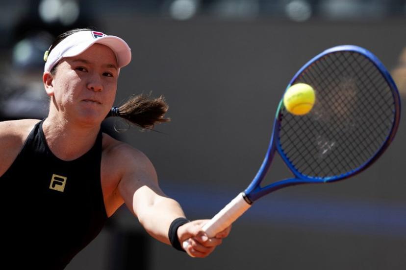 New Zealand's Lulu Sun hits a return to Italy's Jasmine Paolini during their match of the WTA Rome Open tennis tournament at the Foro Italico in Rome, on May 8, 2025.   MARCO BERTORELLO / AFP