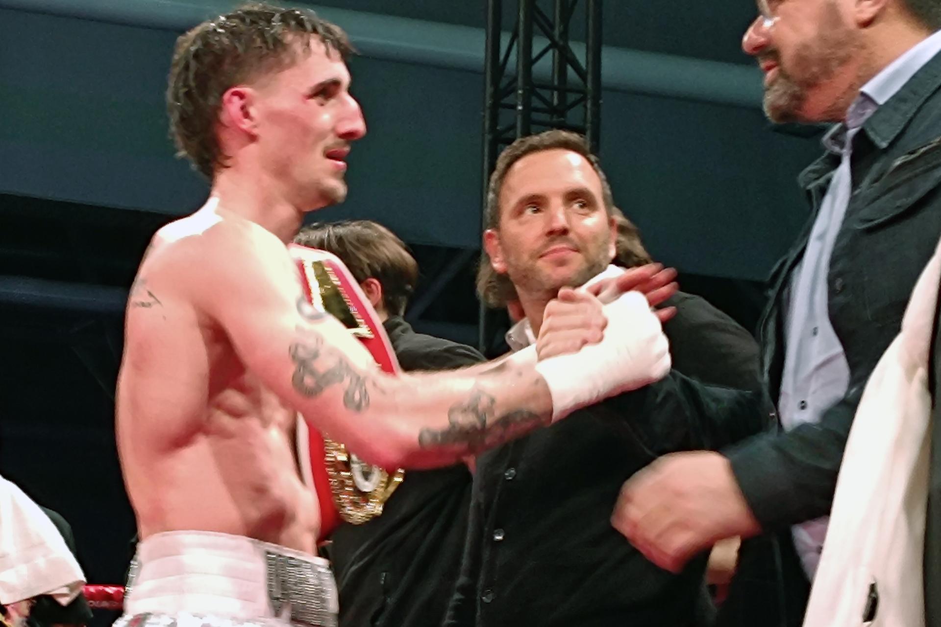Belgian boxer Antoine Vanackere celebrates after winning his fight, Sunday 21 April 2024 in Louvain-La-Neuve. BELGA PHOTO BERNARD CERF