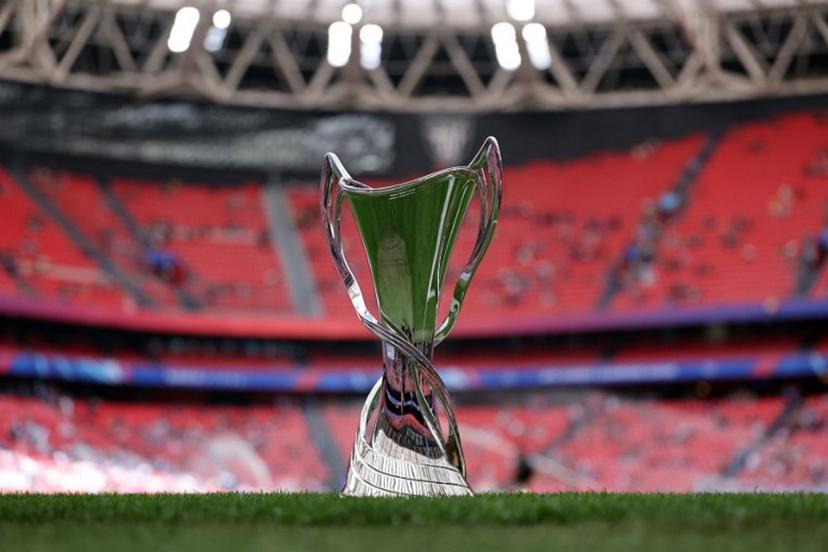 The championship's trophy is displayed on the pitch prior to the UEFA Women's Champions League final football match between FC Barcelona and  Olympique Lyonnais at the San Mames stadium in Bilbao on May 25, 2024.  Thomas COEX / AFP