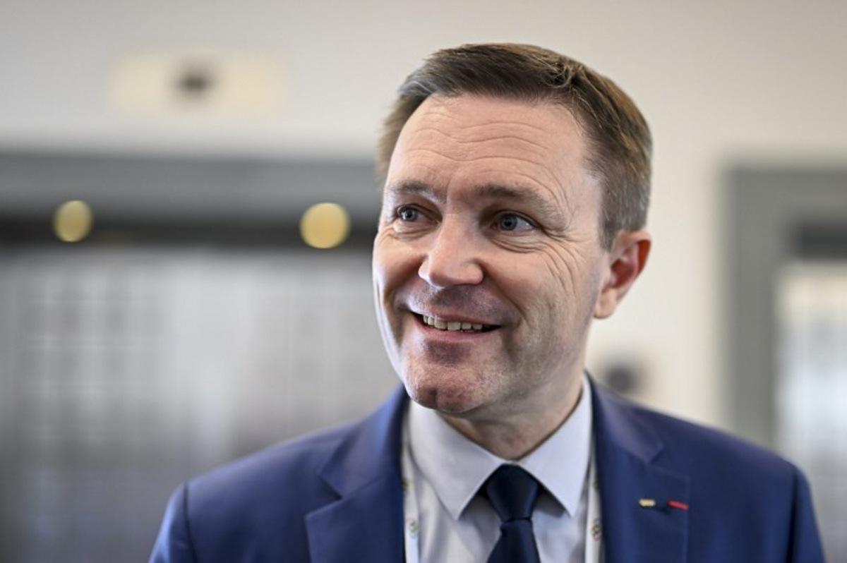 Candidate to the presidency of the International Olympic Committee (IOC) David Lappartient of France speaks to the presse during the 144th IOC Session in Costa Navarino, Greece, where the next IOC President will be elected, on March 19, 2025.  The election between seven canditates will take place on March 20, 2025. Fabrice COFFRINI / AFP