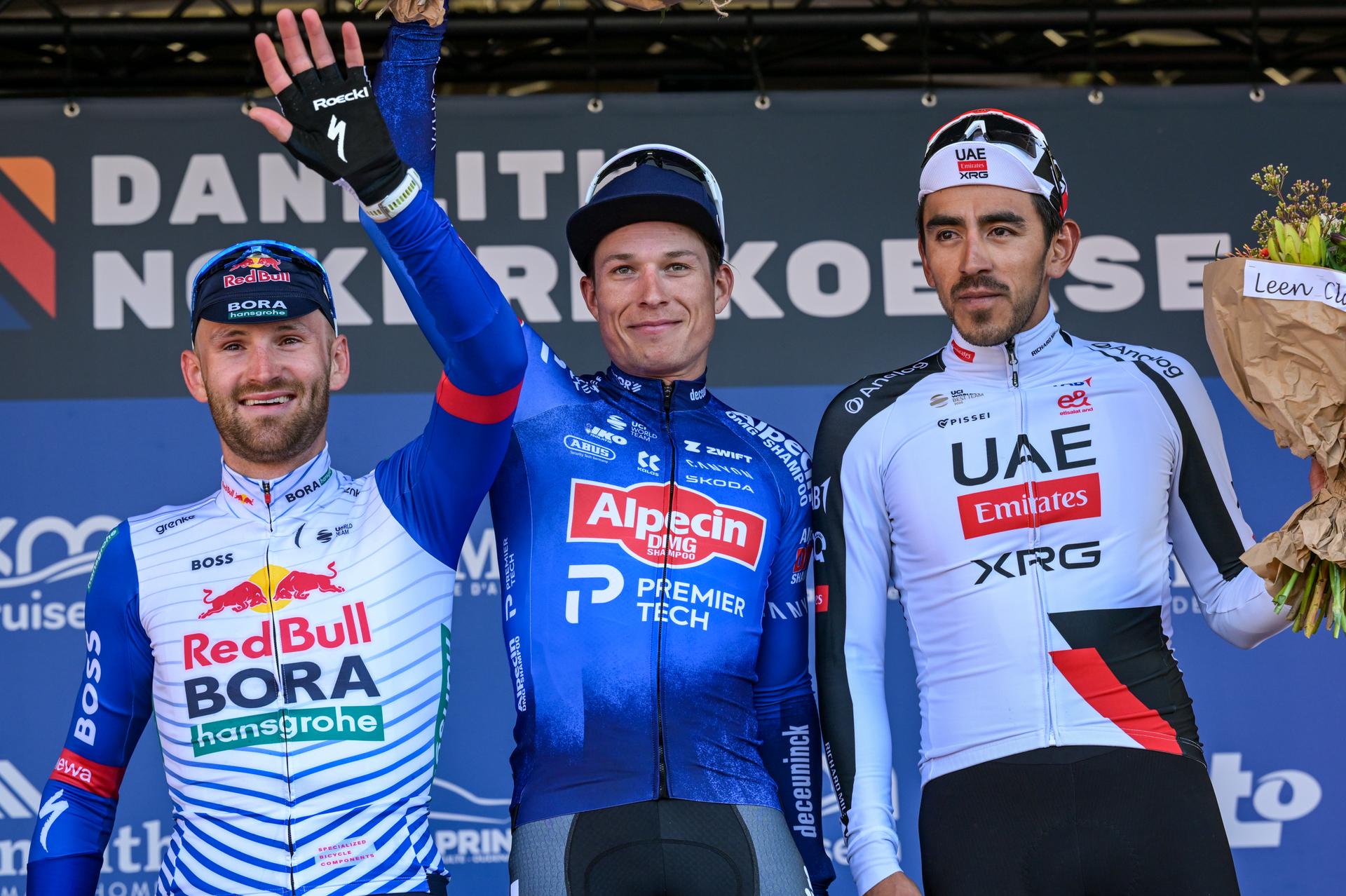 Belgian Jordi Meeus of Red Bull-BORA-hansgrohe, Belgian Jasper Philipsen of Alpecin-Premier Tech and Colombian Juan Sebastian Molano of UAE Team Emirates-XRG pictured on the podium after the 'Nokere Koerse' one day cycling race for men elite, 186,4 km from Deinze to Nokere, Kruisem on Wednesday 18 March 2026. BELGA PHOTO DAVID PINTENS