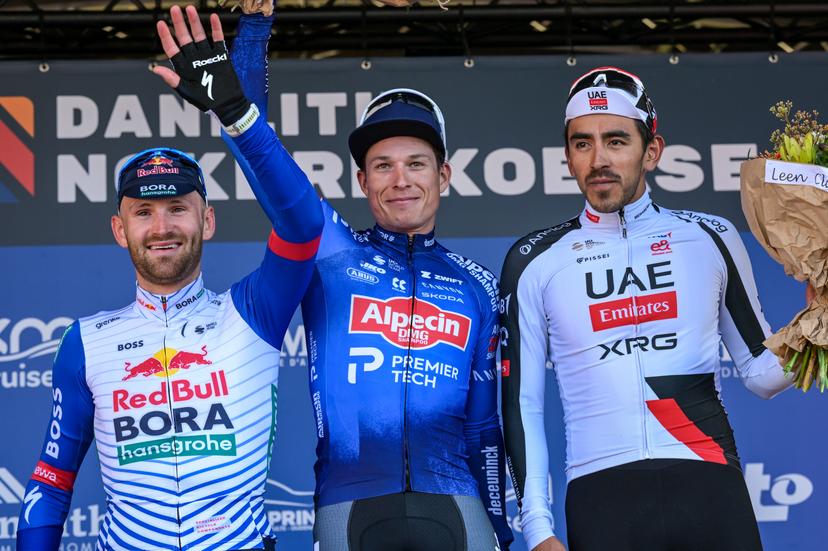 Belgian Jordi Meeus of Red Bull-BORA-hansgrohe, Belgian Jasper Philipsen of Alpecin-Premier Tech and Colombian Juan Sebastian Molano of UAE Team Emirates-XRG pictured on the podium after the 'Nokere Koerse' one day cycling race for men elite, 186,4 km from Deinze to Nokere, Kruisem on Wednesday 18 March 2026. BELGA PHOTO DAVID PINTENS