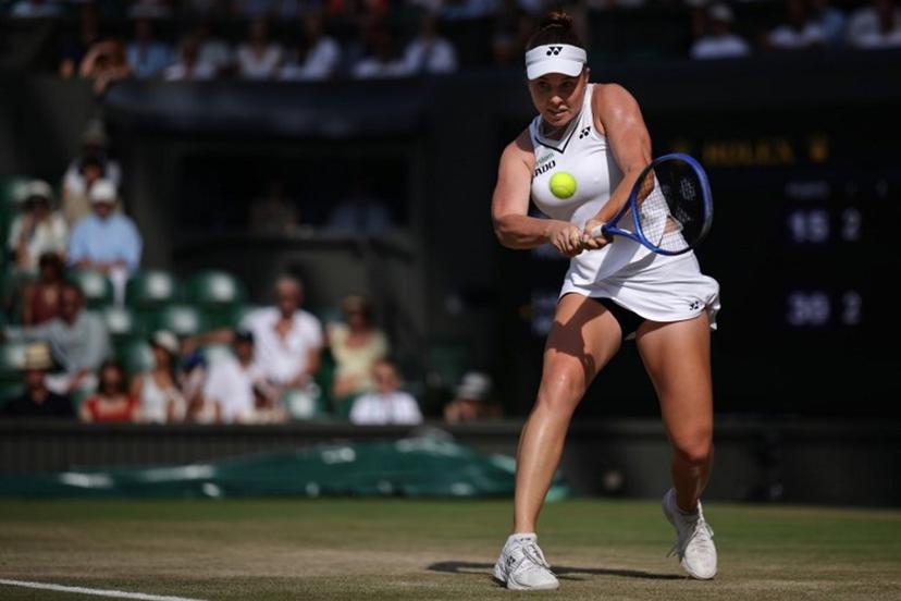 Czech Republic's Linda Noskova returns to Ukraine's Marta Kostyuk during their women's singles semi-final tennis match on the eleventh day of the 2026 Wimbledon Championships at The All England Lawn Tennis and Croquet Club in Wimbledon, southwest London, on July 9, 2026.  Henry NICHOLLS / AFP