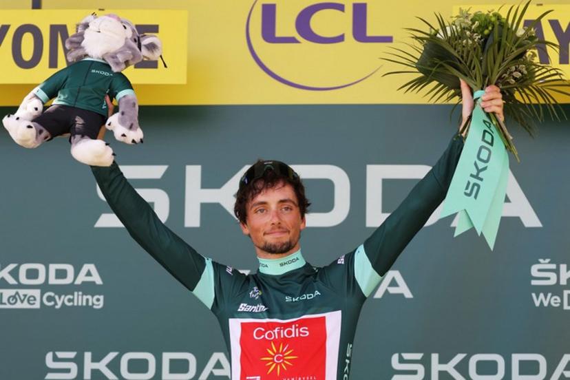 Cofidis' French rider Victor Lafay celebrates on the podium with the best sprinter's green jersey after the 3rd stage of the 110th edition of the Tour de France cycling race, 193,5 km between Amorebieta-Etxano in Northern Spain and Bayonne in southwestern France, on July 3, 2023.  Thomas SAMSON / AFP