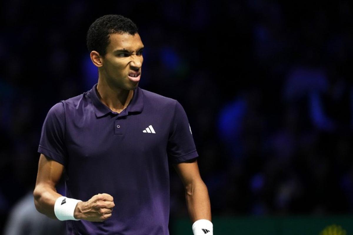 Canada's Felix Auger-Aliassime reacts after winning the first set as he plays against Kazakhstan's Alexander Bublik during their men's singles semi-final match on day six of the Paris ATP Masters 1000 tennis tournament at the Paris La Défense Arena in Nanterre, on the outskirts of Paris, on November 1, 2025.  Dimitar DILKOFF / AFP