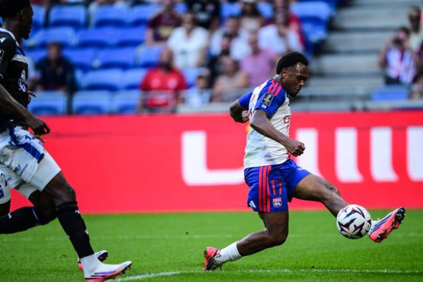 Lyon's Belgium forward #17 Lois Openda (C) shoots at the goal during the French L1 football match between Olympique Lyonnais (OL) and AJ Auxerre at the Parc Olympique Lyonnais Groupama stadium in Decines-Charpieu, central-eastern France, on September 4, 2026.  OLIVIER CHASSIGNOLE / AFP