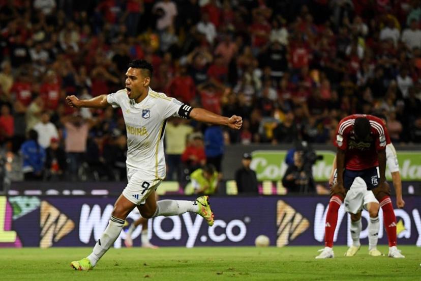 Millonarios' forward Radamel Falcao (L) celebrates his team's first goal scored by Millonarios' Argentine forward Santiago Giordana (unseen) during the Liga Betplay Dimayor II football league match between Independiente Medellin and Millonarios at Atanasio Girardot Stadium in Medellin, Colombia on July 18, 2024.  Jaime SALDARRIAGA / AFP