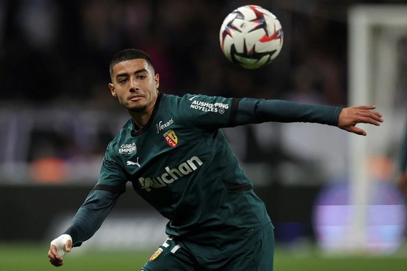 Lens' Moroccan forward #21 Anass Zaroury eyes the ball during the French L1 football match between Toulouse FC and RC Lens at The TFC Stadium in Toulouse, southwestern France, on May 10, 2025.  Valentine CHAPUIS / AFP
