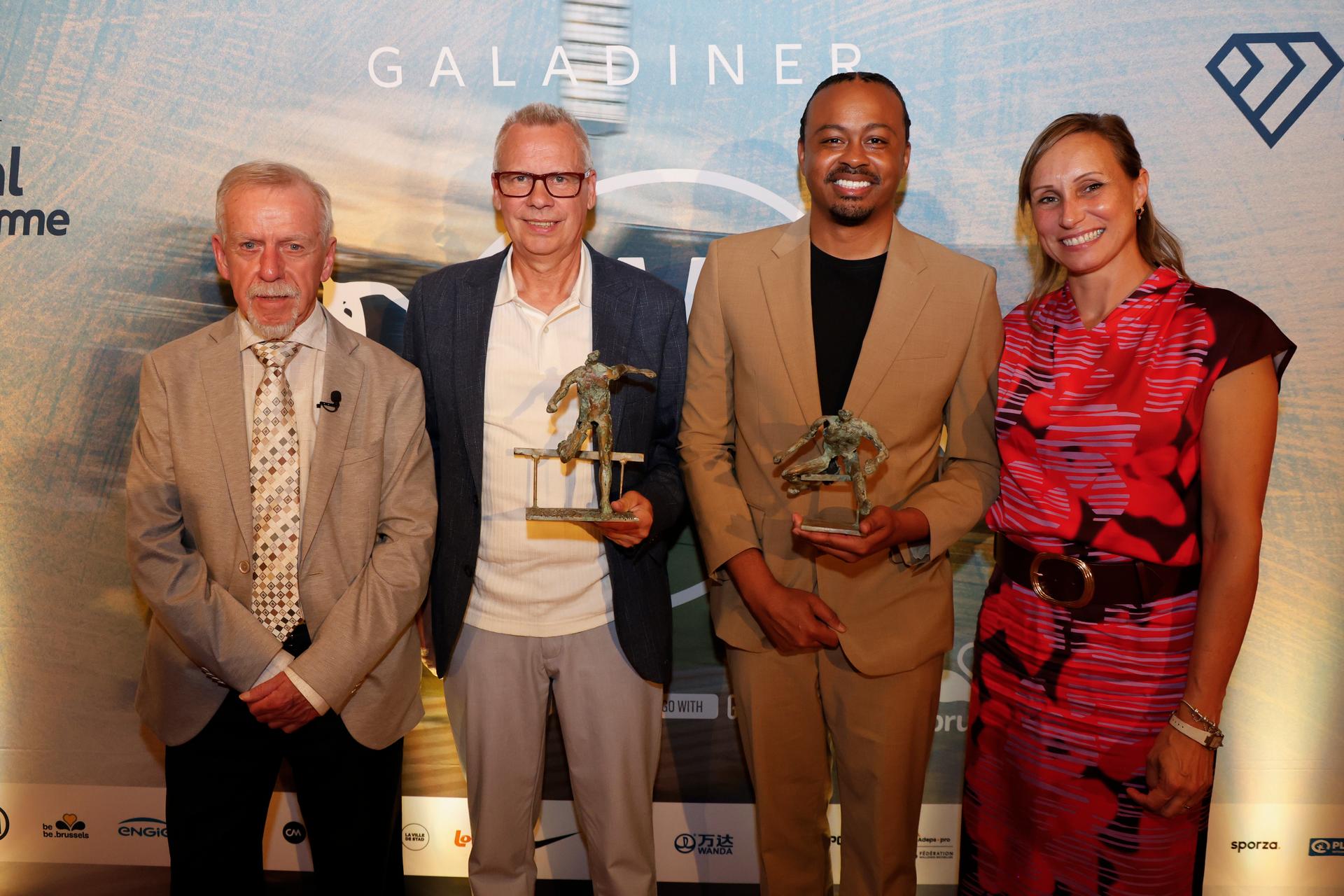Wilfried Meert, Former steeple athlete William Van Dijck, US athlete Aries Merritt and Memorial Van Damme meeting director Kim Gevaert pictured during a gala dinner before the Memorial Van Damme athletics event in Brussels, Thursday 21 August 2025. The 49th edition of the Allianz Memorial Van Damme - Wanda Diamond League meeting takes place on 22 August 2025. BELGA PHOTO NICOLAS MAETERLINCK