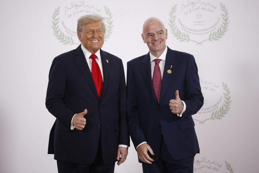 FIFA President Gianni Infantino (R) and US President Donald Trump pose during a summit on Gaza in Sharm el-Sheikh on October 13, 2025. Trump landed in Egypt on October 13 for a summit on Gaza, following a lightning visit to Israel after a ceasefire he brokered entered into force Yoan VALAT / POOL / AFP
