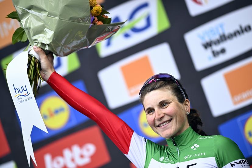 Italian Elisa Longo Borghini of UAE Team ADQ celebrate on the podium of the women's race of the 'La Fleche Wallonne', one day cycling race (Waalse Pijl - Walloon Arrow), 140,7 km from Ciney to Huy, Wednesday 23 April 2025. BELGA PHOTO JASPER JACOBS