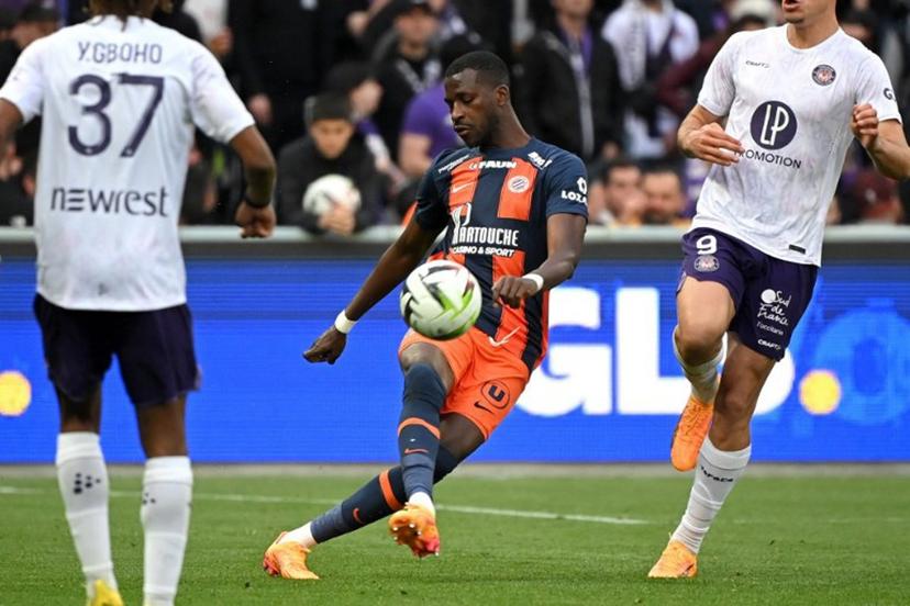 Montpellier's Malian defender #04 Boubakar Kouyate kicks the ball during the French L1 football match between Toulouse FC and Montpellier Herault SC at the TFC Stadium in Toulouse, southwestern France, on May 3, 2024.  Matthieu RONDEL / AFP