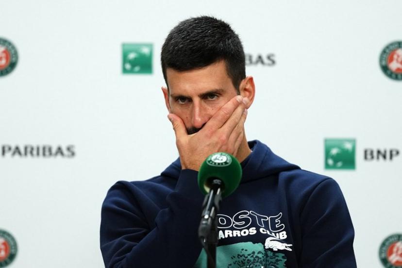 Serbia's Novak Djokovic holds a press conference after he lost his men's singles semi-final match against Italy's Jannik Sinner on day 13 of the French Open tennis tournament on Court Philippe-Chatrier at the Roland-Garros Complex in Paris on June 6, 2025.  Dimitar DILKOFF / AFP
