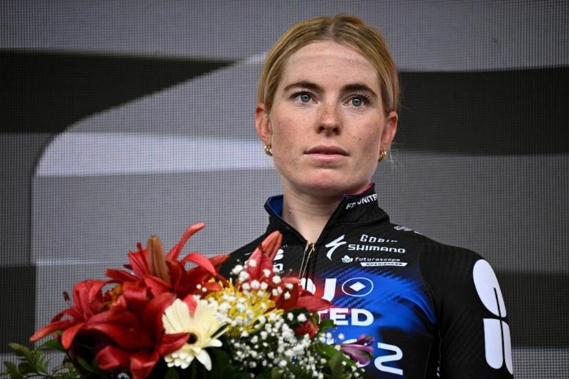Second-placed FDJ-SUEZ team's Dutch rider Demi Vollering celebrates on the podium for the fourth edition of the Women's Tour de France cycling race at the end of the 9th and final stage (out of 9) 124.1 km from Praz-sur-Arly to Chatel, in Chatel, eastern France on August 3, 2025.  JULIEN DE ROSA / AFP